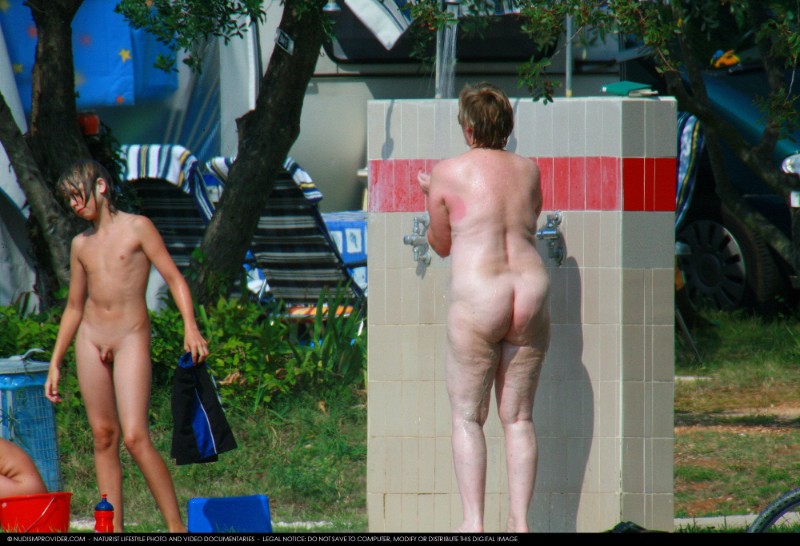 Covered in Towel Nudists-Boardwalk Biking Nudists