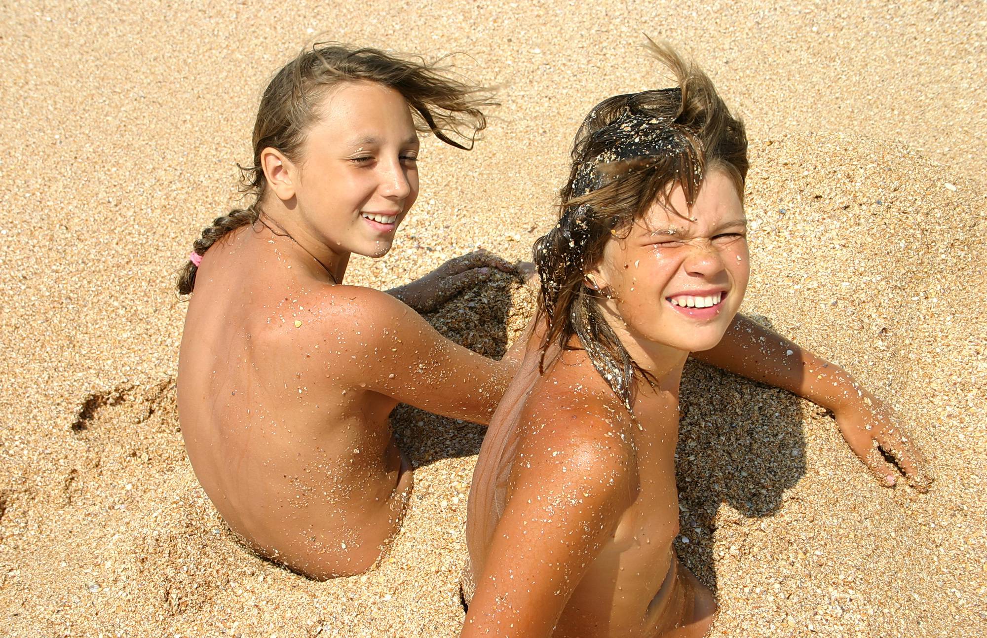 Young Nudism - Ocean Beach Relaxing