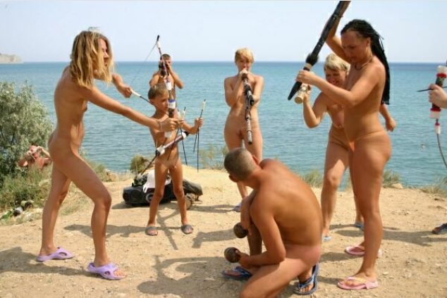Nudists on a beach play Indians | NakedBody