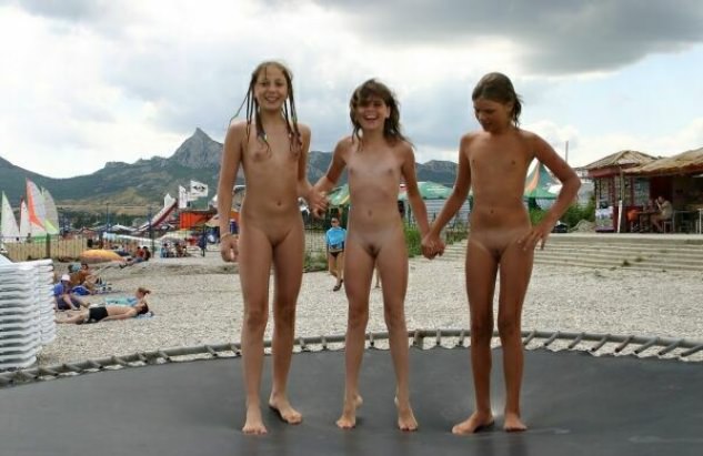 Family nudism - little girls nudists on a trampoline | NakedBody